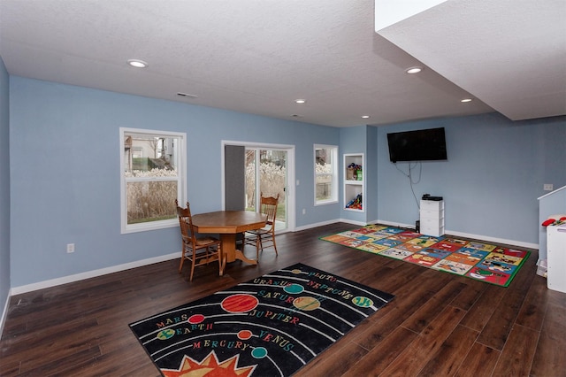 rec room with recessed lighting, baseboards, and wood finished floors