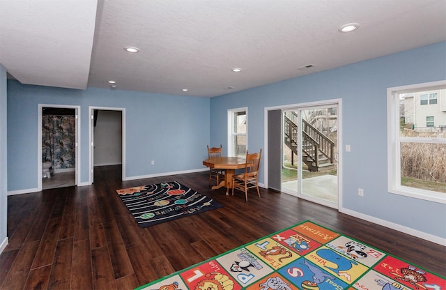 game room featuring recessed lighting, baseboards, and wood finished floors