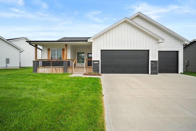 modern inspired farmhouse with board and batten siding, covered porch, an attached garage, and concrete driveway