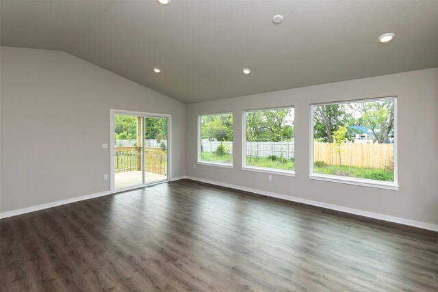 1099 NE 64th Ave, Des Moines, IA 50313 - empty room featuring lofted ceiling, baseboards, dark wood finished floors, and recessed lighting