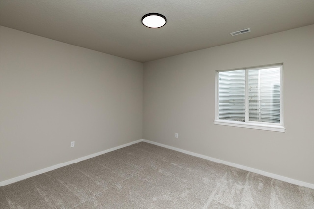 1099 NE 64th Ave, Des Moines, IA 50313 - carpeted empty room with baseboards