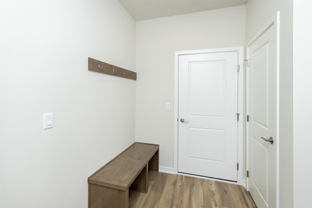 mudroom with light wood-style floors