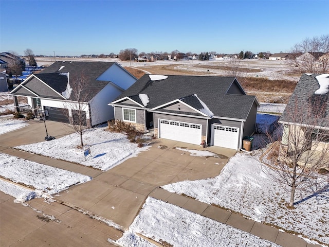 ranch-style home with a garage