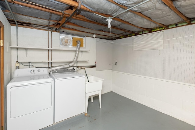 clothes washing area with independent washer and dryer