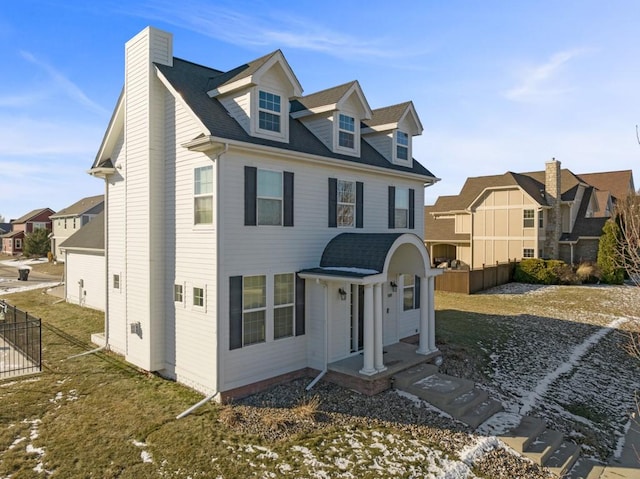 view of front of home with a front yard