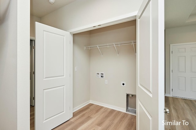 washroom with laundry area, baseboards, hookup for an electric dryer, light wood-type flooring, and washer hookup