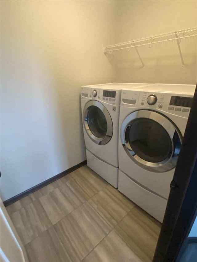 laundry room featuring independent washer and dryer