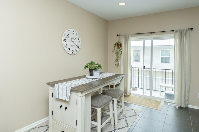 dining area featuring tile patterned floors