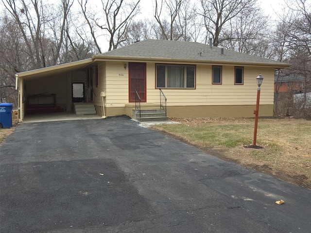 single story home with a carport