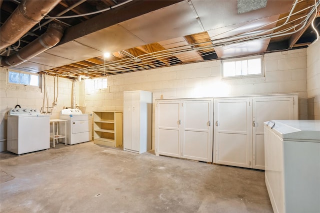 basement featuring washer and dryer