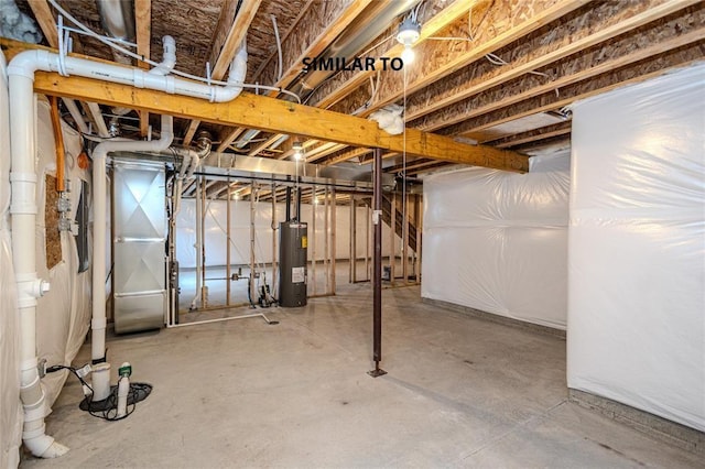 basement featuring heating unit and water heater