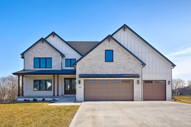 modern inspired farmhouse featuring driveway, board and batten siding, and a front yard