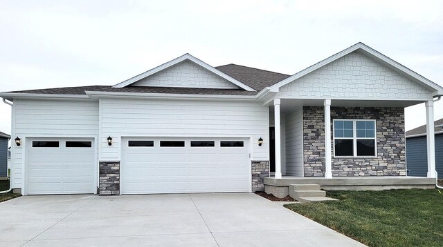 craftsman inspired home with a garage