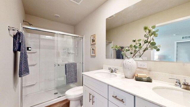 1155 Magnolia Ln, Waukee, IA 50263 - bathroom with double vanity and a stall shower