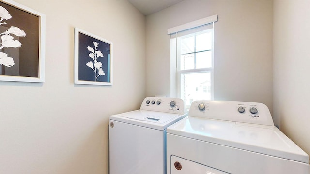 1155 Magnolia Ln, Waukee, IA 50263 - laundry area with washing machine and clothes dryer