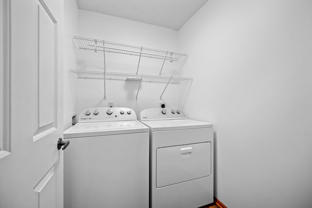 laundry room with washer and dryer