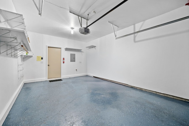 garage featuring a garage door opener and electric panel