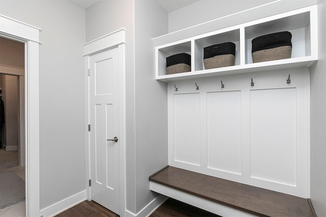 mudroom with dark hardwood / wood-style floors