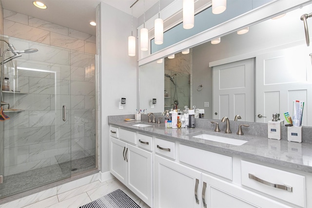 bathroom featuring vanity and walk in shower