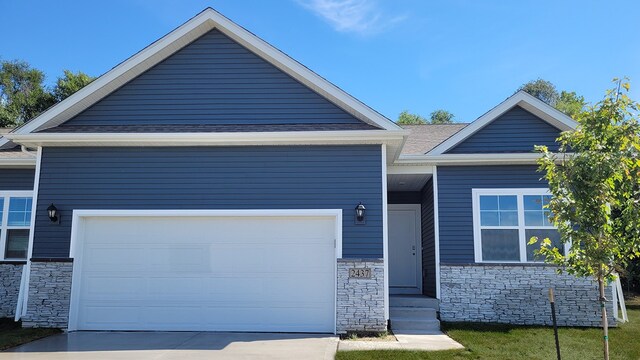 craftsman-style home with a garage