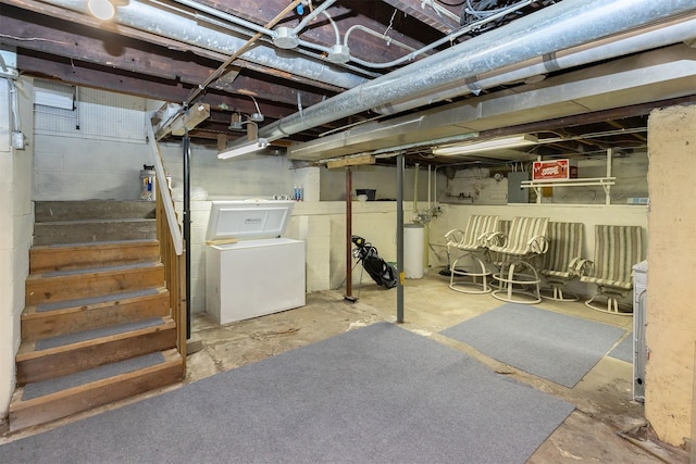 basement with electric panel and washer / clothes dryer