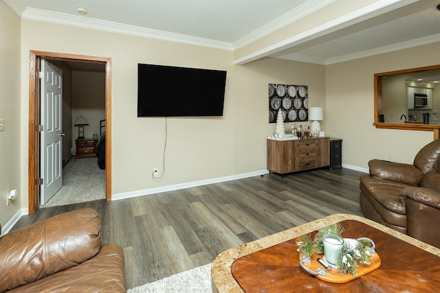 living room with dark hardwood / wood-style floors and ornamental molding