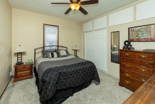 bedroom featuring light carpet, a closet, and ceiling fan