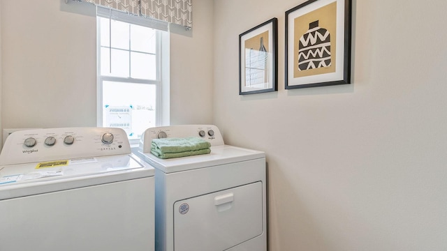 laundry area with separate washer and dryer