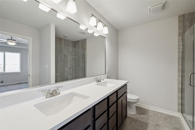 full bathroom featuring a stall shower, visible vents, a sink, and double vanity