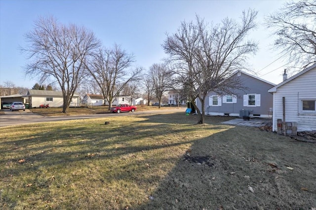 view of yard featuring central AC