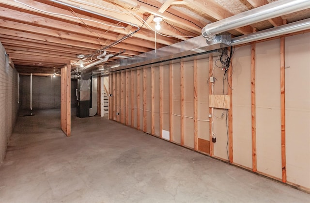 basement featuring heating unit