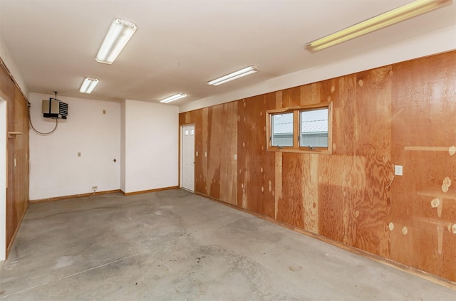 basement with wood walls