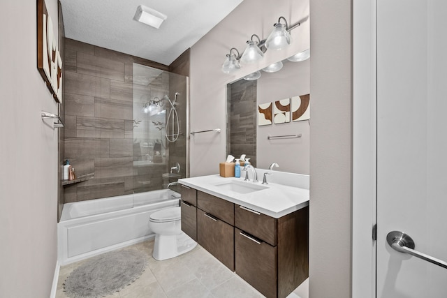 full bathroom featuring tile patterned floors, a textured ceiling, vanity, shower / bath combination with glass door, and toilet