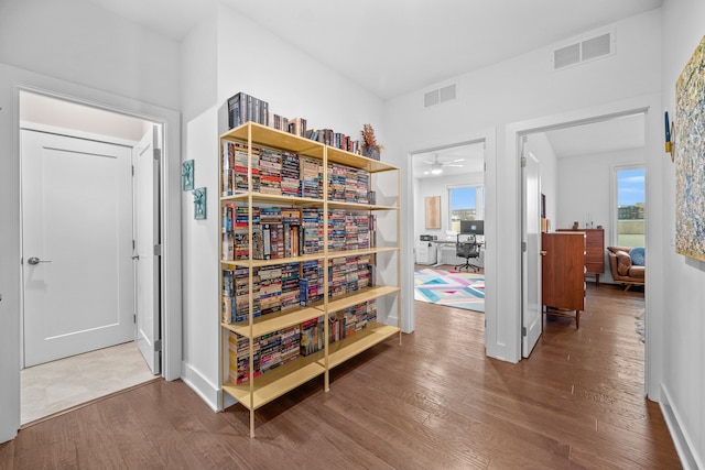 hall featuring wood-type flooring