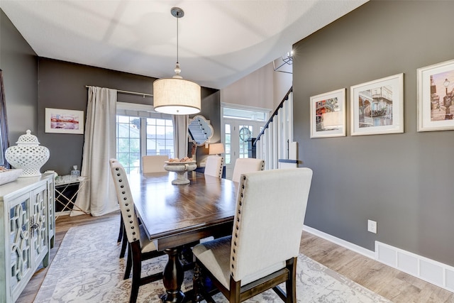 dining room with hardwood / wood-style flooring