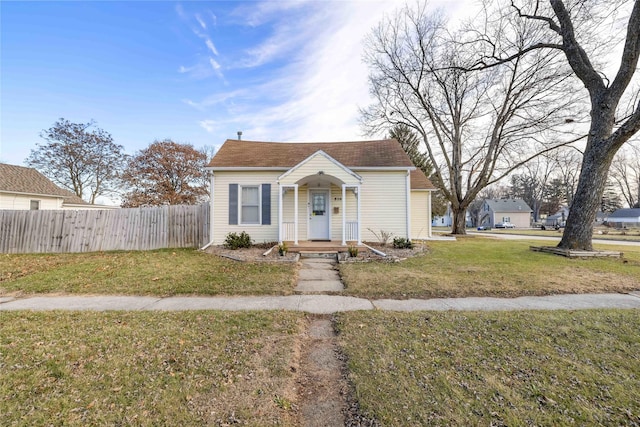 bungalow with a front lawn