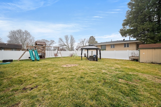 view of yard with a playground and a gazebo