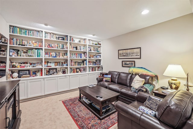 living room featuring light carpet and recessed lighting