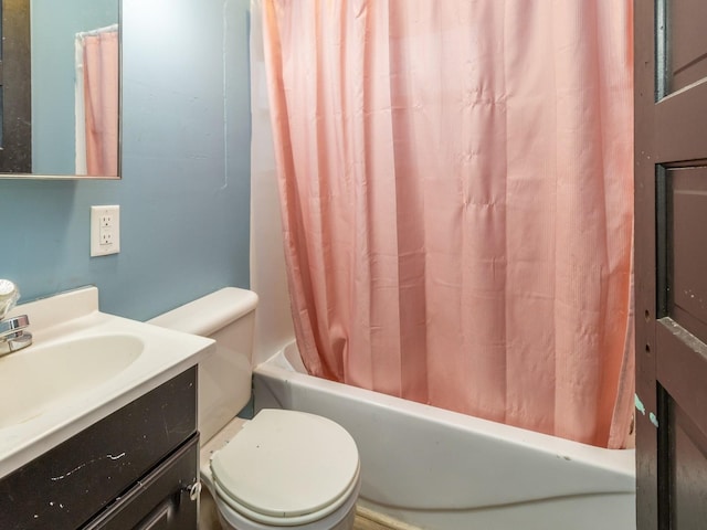 full bathroom featuring vanity, toilet, and shower / bathtub combination with curtain