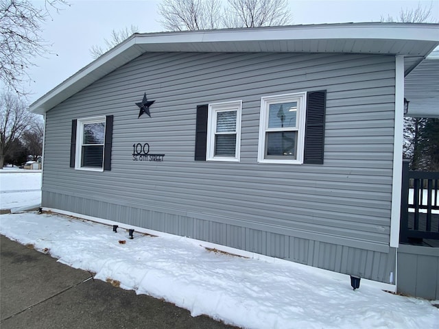 view of snow covered property