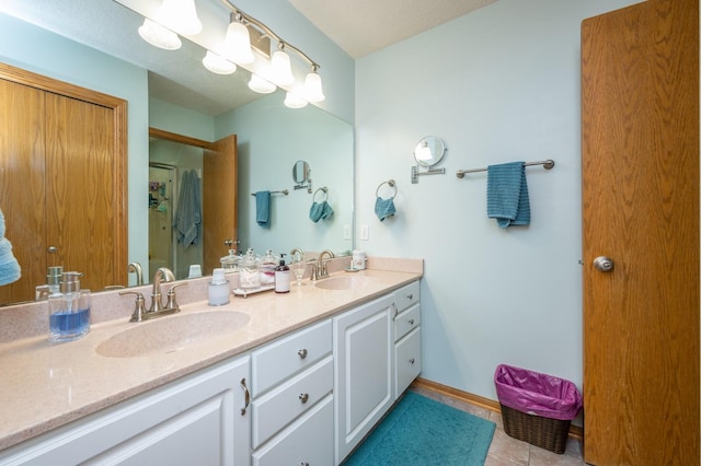 bathroom featuring vanity and tile patterned floors