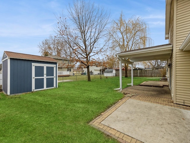 view of yard with a patio area and a shed