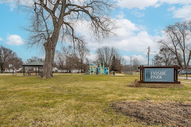 view of community with a playground, a gazebo, and a yard