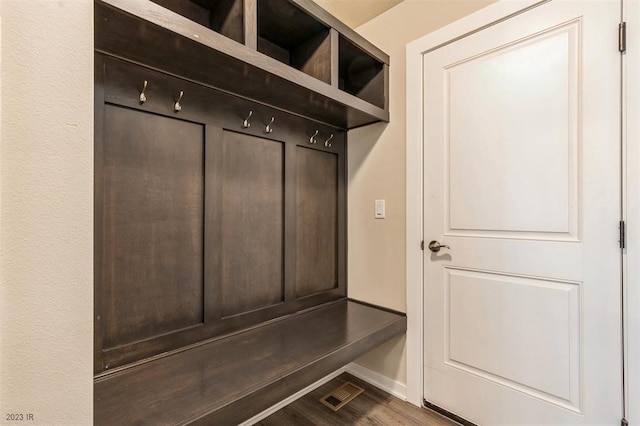 mudroom with wood-type flooring