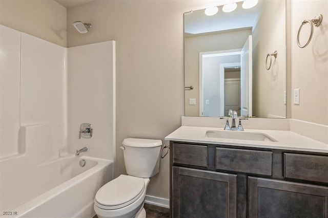 full bathroom with vanity, tub / shower combination, and toilet