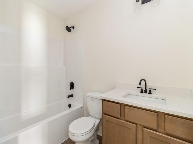 bathroom featuring shower / bathing tub combination, toilet, and vanity