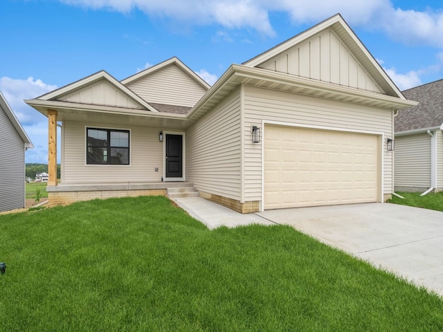 201 S Valley View Dr, Norwalk, IA 50211 - view of front of home featuring board and batten siding, concrete driveway, a front yard, and a garage