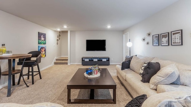 carpeted living room featuring recessed lighting, stairway, and baseboards