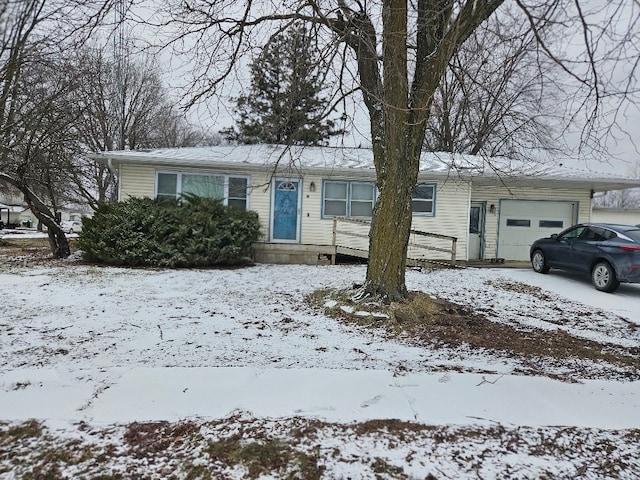 single story home with a garage