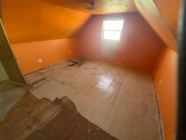 bonus room featuring vaulted ceiling